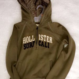 A fuzzy Hollister sweatshirt.